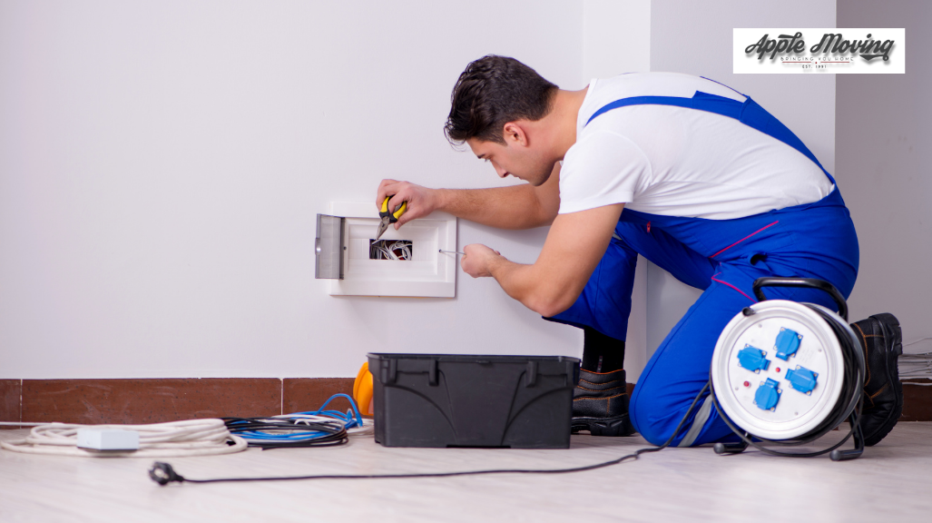 man checking up on electric outlet